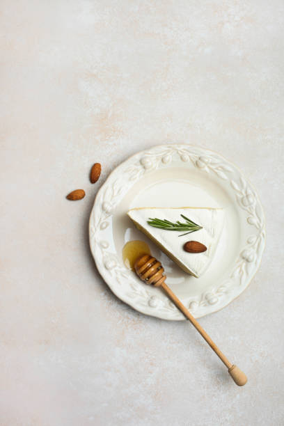 istock Camembert cheese with honey 1132724638