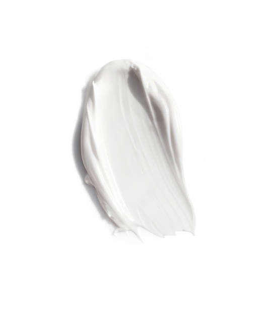 smeared creme on white background. - moisturizer cosmetics beauty treatment jar imagens e fotografias de stock
