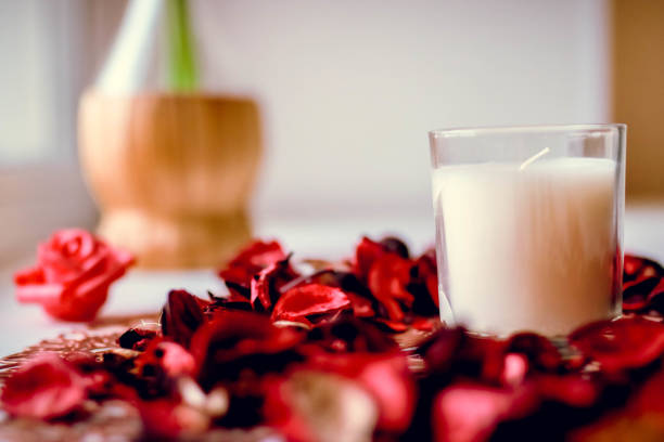 istock Candle and rose petals. Beautiful romatic composition. 1132726516