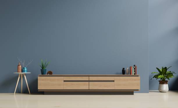 istock Tv cabinet in modern empty room on Dark wall 1132728622