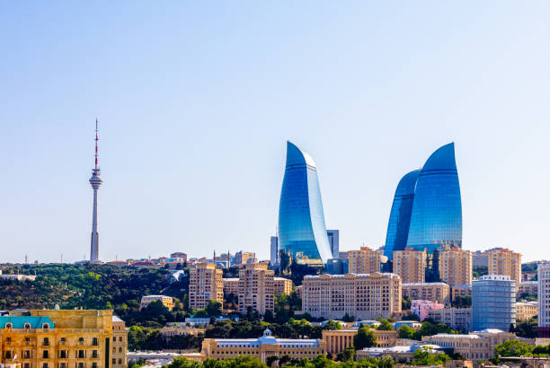 View from the old city to the central business district with lots of buildings, skyscrapers and tv tower, Baku, Azerbaijan View from the old city to the central business district with lots of buildings, skyscrapers and tv tower, Baku, Azerbaijan baku stock pictures, royalty-free photos & images