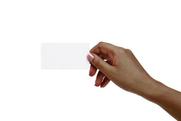 istock African female hand holds white card on a white background. 1132731722