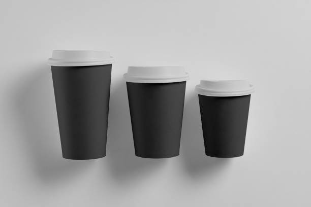 istock Paper black coffee cup with white lid isolated on white background 1132732099