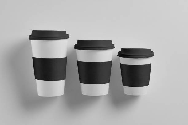 istock Paper white coffee cup with black lid and black label isolated on white background 1132732328