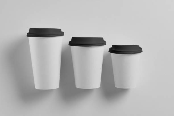 istock Paper white coffee cup with black lid isolated on white background 1132732421