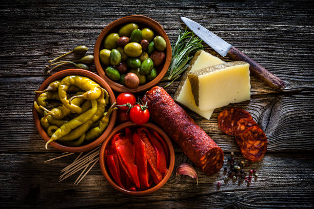 istock Tapas: typical spanish food shot from above on rustic wooden table 1132733375