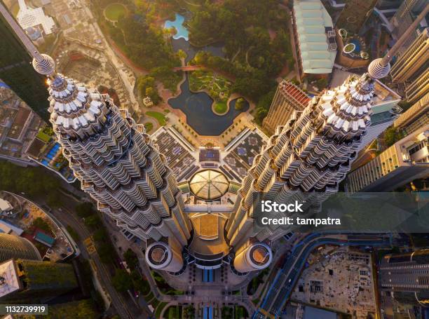Top Of Petronas Twin Towers Aerial View Of Kuala Lumpur Downtown Malaysia Financial District And Business Centers In Smart Urban City In Asia Skyscraper And Highrise Buildings At Sunset Stock Photo - Download Image Now