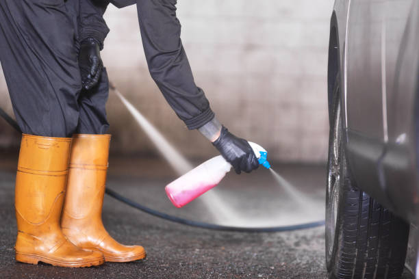 istock Professional car washer cleaning alloy wheels. 1132740257