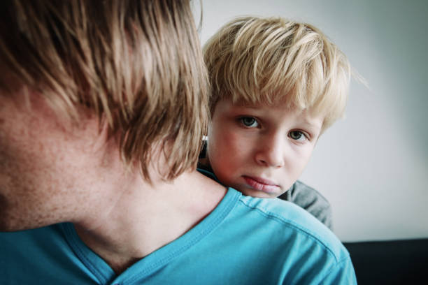istock Father comforting stressed sad child, parenting, sorrow 1132741148