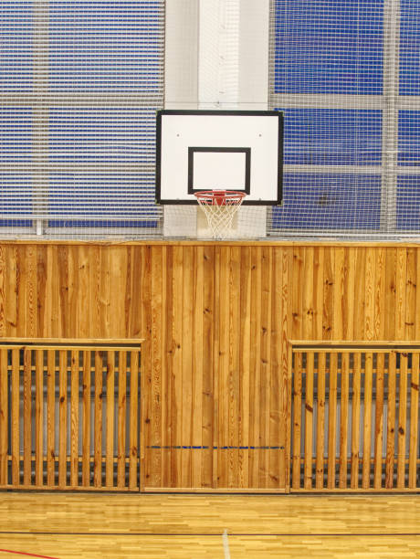istock School gym with basketball basket board 1132741153