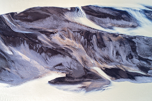 Abstract pattern of braided glacial river flows in Iceland from above.