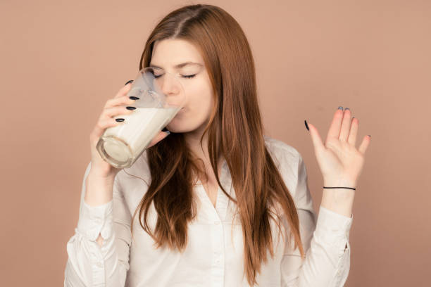 istock cute girl likes hate milk 1132742983