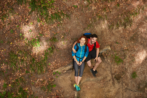 high angle view of hikers lying down and relaxing.