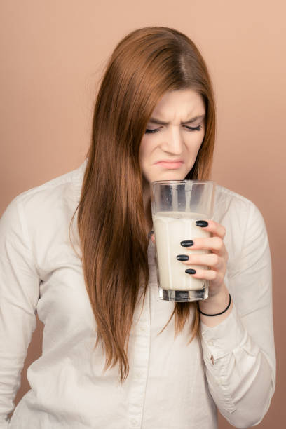 istock cute girl like hate milk 1132743303