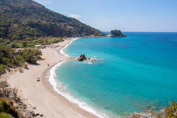 istock turquoise water at Potami beach 1132743305