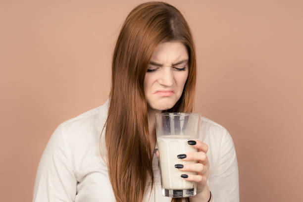 istock cute girl like hate milk 1132743308
