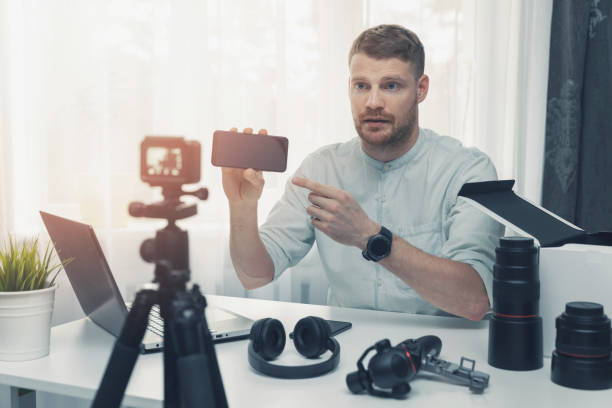 istock technology blogger recording new smart phone review 1132747429