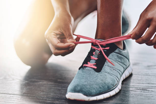 istock Lace up and show up 1132747459