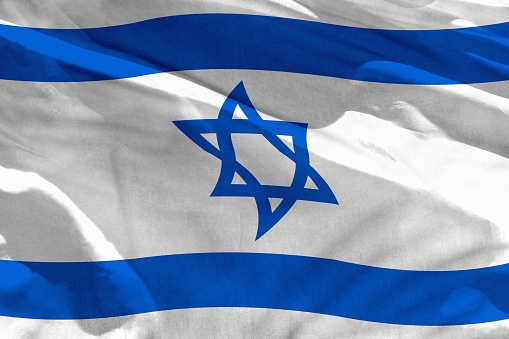 Fluttering Israel flag for using as texture or background, the flag is waving on the wind