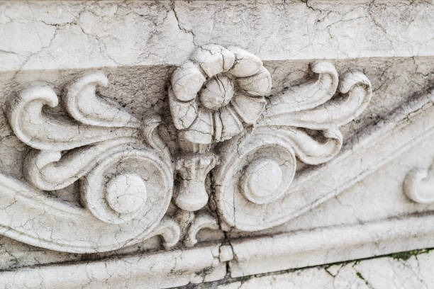 istock A low relief flower engraved as a decoration in the stone 1132754633