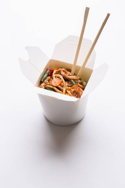 istock Noodles wok in cardboard box 1132754838