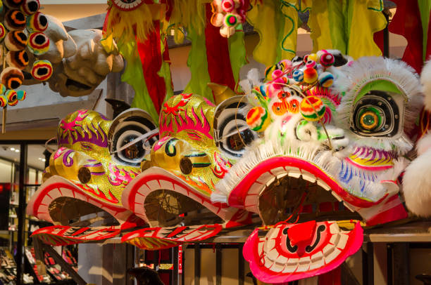 istock Traditional chinese lion dance head display on the shelves. 1132758975