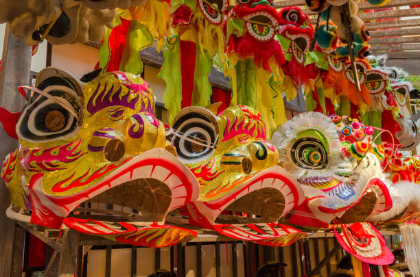 istock Traditional chinese lion dance head display on the shelves. 1132758976