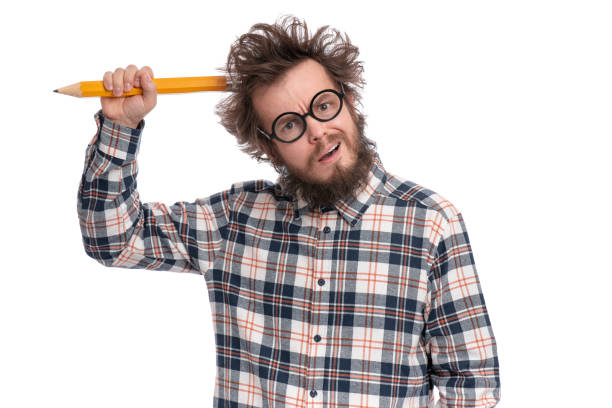 istock Crazy bearded man with big pencil 1132759142