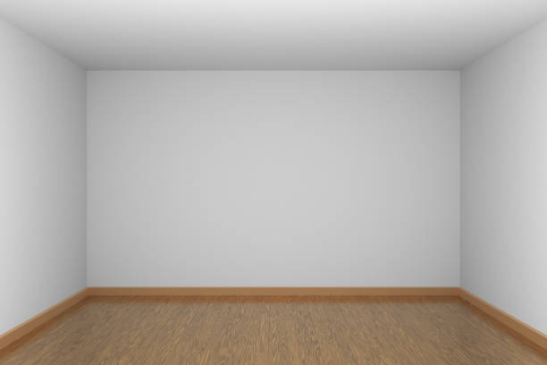 istock White empty room dark side with brown wooden parquet floor 1132760929