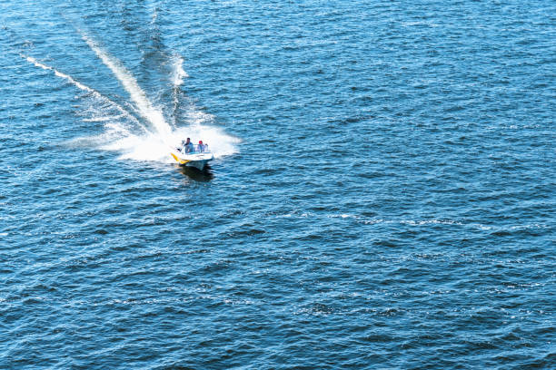 istock High-speed boat floats on the sea, view from above 1132763396