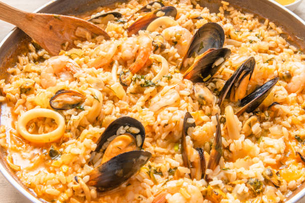 istock Seafood risotto in a frying pan - a classic Italian dish 1132764485