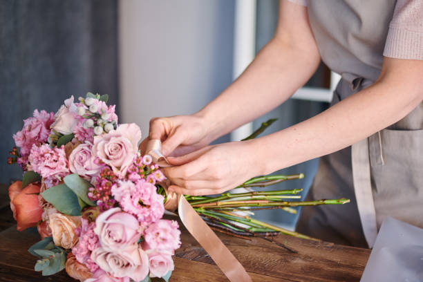 istock Tying bouquet with silk ribbon 1132764901