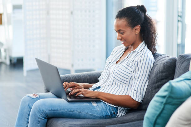 istock Corresponding with her international buddies via email 1132766370