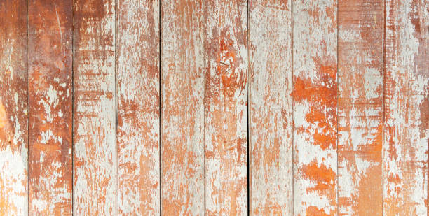 abstract background from old brown wood pattern wall with grunge, scratched and peel off texture surface. retro and vintage backdrop. - wood reclaimed abstract dark imagens e fotografias de stock