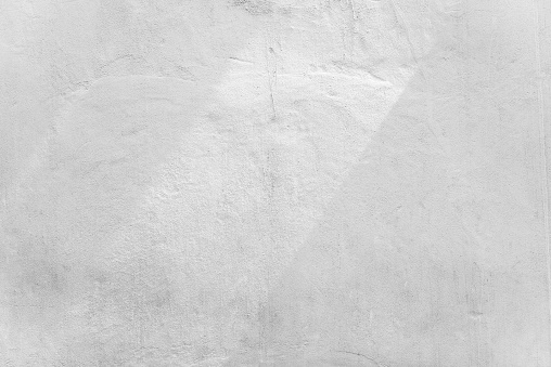 Fondo abstracto de pared de hormigón blanco con luz solar, luz y sombra. photo