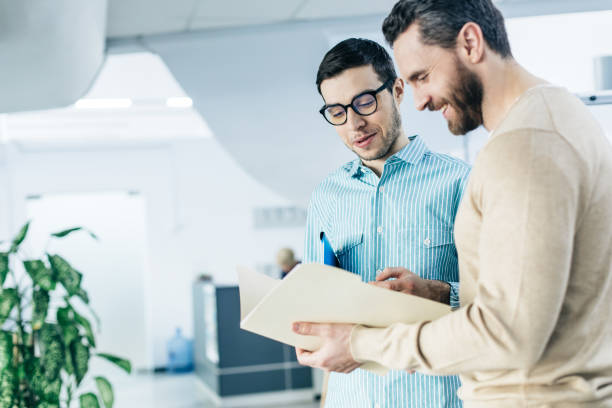 istock Two bearded men are satisfied with results at meeting in classroom training 1132768223