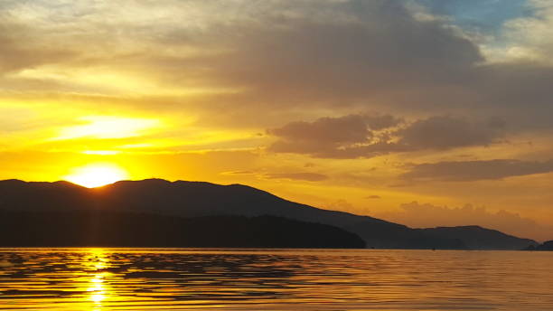istock Bright sunset over the sea surface . Evening by the sea. Relaxation 1132770004