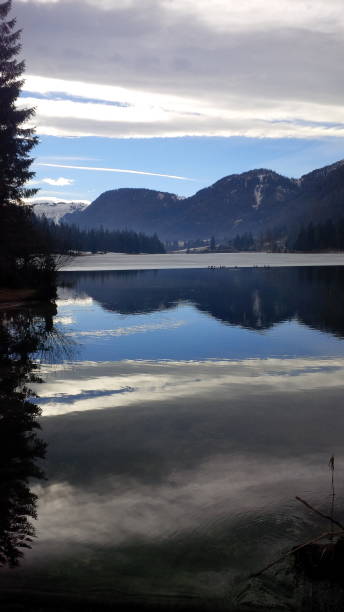 istock Reflection in the water of the alps 1132772838