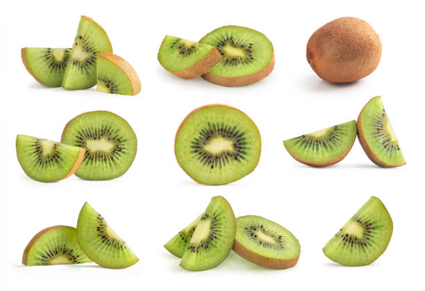 o quivi ajustou-se no fundo branco - fruta kiwi - fotografias e filmes do acervo