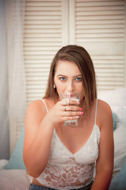 istock Young woman having coffee in the morning 1132774414