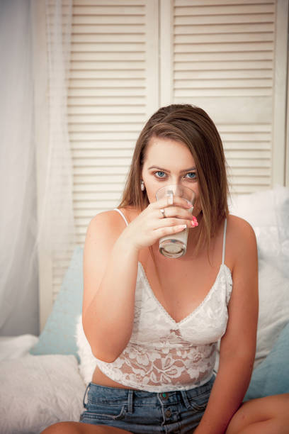 istock Young woman having coffee in the morning 1132774417