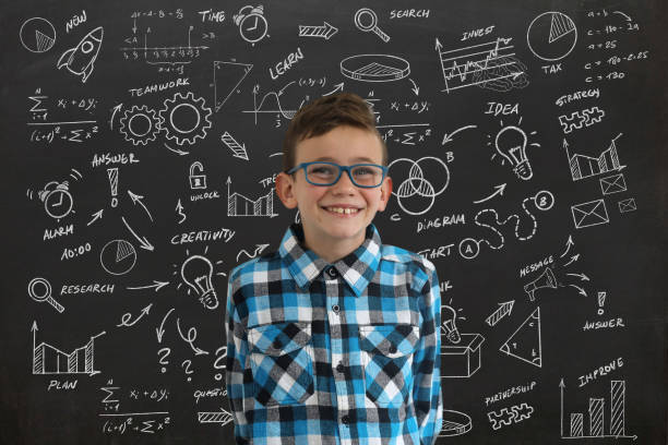 istock Boy child smile happy idea decision business strategy background blackboard 1132779082