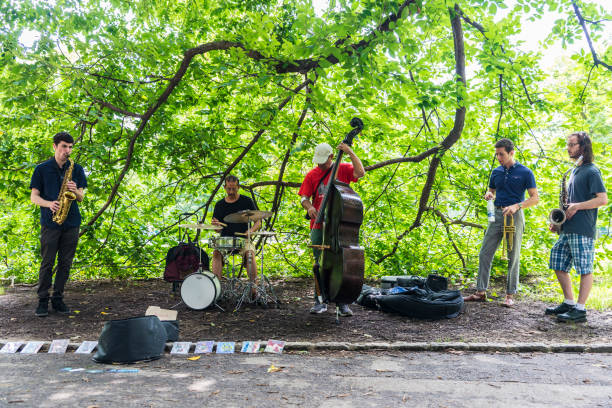 Musicians of jazz and blues playing in Central Park, New York City, USA New York City, USA - July 28, 2018: Musicians of jazz and blues playing in a performance in Central Park, New York City, USA bass drum photos stock pictures, royalty-free photos & images