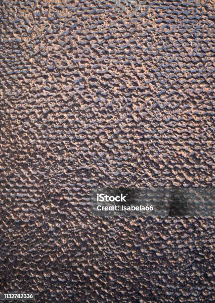 Glossy Brown Relief Cladding Tiles On Wall Closeup Stock Photo - Download Image Now - Textured, Art, Art And Craft