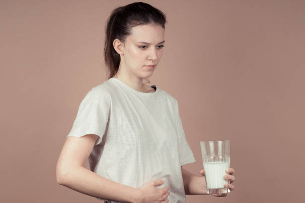 istock cute girl like hate milk 1132782475