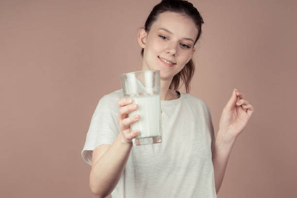 istock cute girl like hate milk 1132782635