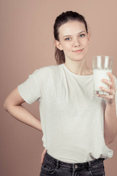 istock cute girl like hate milk 1132782687