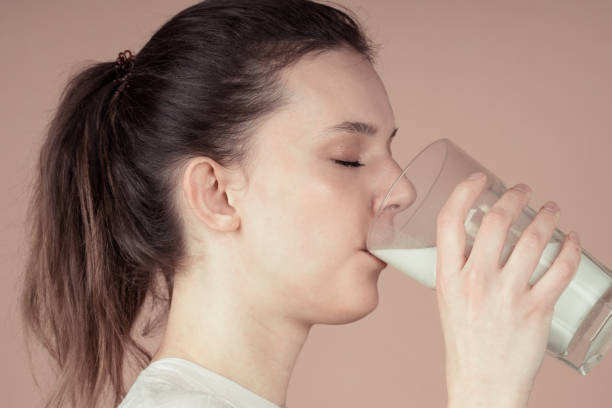 istock cute girl like hate milk 1132782808