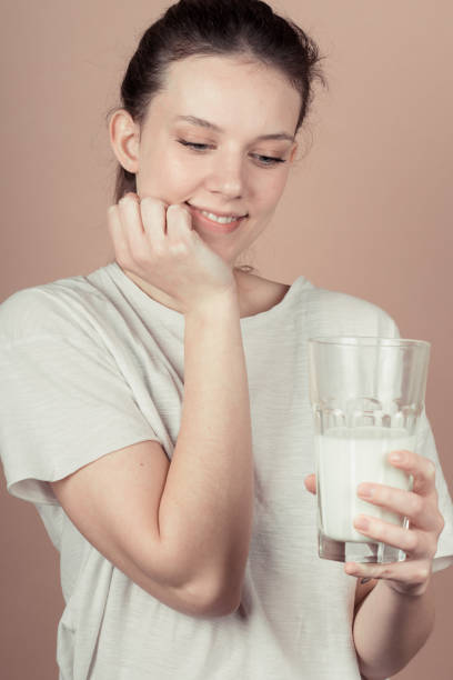 istock cute girl like hate milk 1132782856