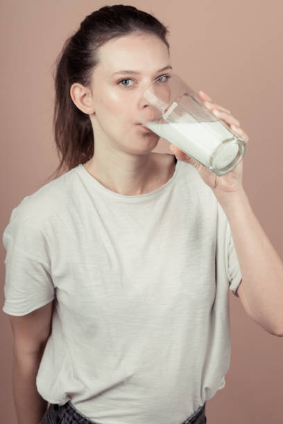 istock cute girl like hate milk 1132782905